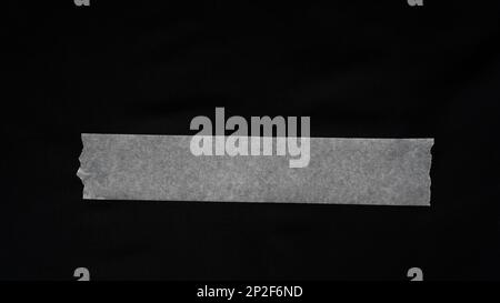 Paper tape. black color Paper tape affixed on the table. paper tape roll Stock Photo