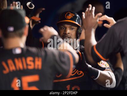 Baltimore Orioles Adam Jones (10), forced at second base, yells to Nelson  Cruz, who scored an RBI on the fielder's choice in the fifth inning against  the Kansas City Royals in game