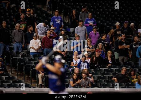 Colorado Rockies baseball fans wearing MLB jerseys showing their