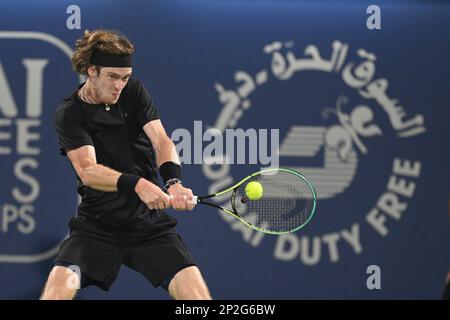 Dubai, UAE, 4th.March, 2023. Russian tennis players at the trophy  presentation, Winner Daniil Medvedev (red shirt) and runner-up Andrey  Rublev at the Dubai Duty Free Tennis Championships tournament at Dubai Duty  Free