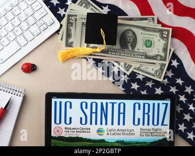 In this photo illustration, University of California, Santa Cruz (UCSC)  logo seen displayed on a tablet. Stock Photo