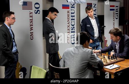 Aug.25, 2015 - St. Louis, Missouri, U.S. - From left, GM FABIANO CARUANA,  GM ANISH GIRI and GM MAGNUS CARLSEN watch the game between GM WESLEY SO and  GM ALEXANDER GRISCHUK on