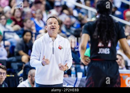 Greensboro, NC, USA. 4th Mar, 2023. Louisville Cardinals head coach Jeff Walz talks with guard Morgan Jones (24), right, during the semifinals of the Women's ACC Tournament at Greensboro Coliseum in Greensboro, NC. (Scott Kinser/Cal Sport Media). Credit: csm/Alamy Live News Stock Photo