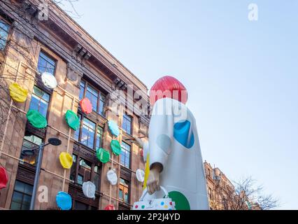 Giant Yayoi Kusama doll on the façade of the