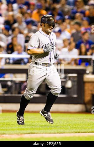 Colorado Rockies shortstop Jose Reyes (7) makes the throw to first base in  a game against the Seattle Mariners. The Rockies defeated the Mariners 7-5  on August 5, 2015, at Coors Field