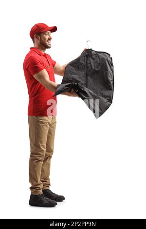 Man delivering clothes from dry cleaners to a mother with a baby ...