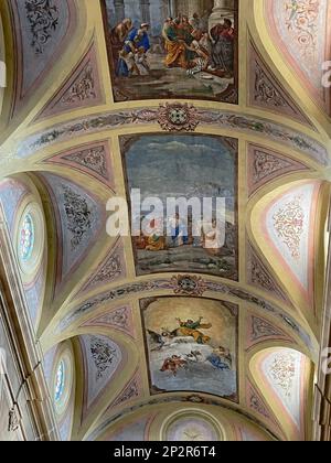 Galatina, Italy. Interior of the 17th century Catholic Church of the Saints Peter and Paul. Ceiling frescoes depicting the life of St. Peter. Stock Photo