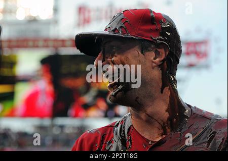 Washington Nationals Max Scherzer can only smile as he is drenched in  celebratory chocolate syrup after pitching a no-hitter against the  Pittsburgh Pirates at Nationals Park on June 20, 2015 in Washington