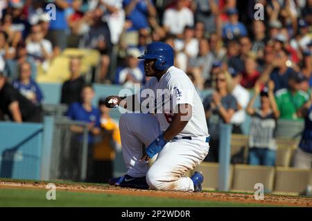 19 June 2015: Los Angeles Dodgers Right field Yasiel Puig (66) [9924]  reacts after narrowly missing a catch in shallow right field during a Major  League Baseball game between the San Francisco