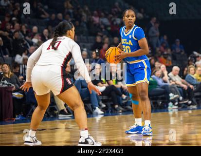 LasVegas, NV, USA. 03rd Mar, 2023. A. UCLA guard Charisma Osborne (20)sets the play during the NCAA Women's Basketball Pac -12 Tournament Semifinals game between UCLA Bruins and the Stanford Cardinal. UCLA beat Stanford 69-65 at Mandalay Bay Michelob Arena Las Vegas, NV. Thurman James /CSM/Alamy Live News Stock Photo