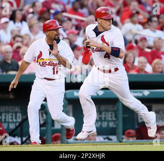 St. Louis Cardinals third base coach Jose Oquendo walks in the