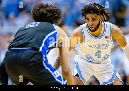 March 4, 2023: North Carolina Tar Heels guard R.J. Davis (4) presses Duke Blue Devils guard Tyrese Proctor (5), left, during the first half of the ACC basketball matchup at Dean Smith Center in Chapel Hill, NC. (Scott Kinser/CSM) Stock Photo