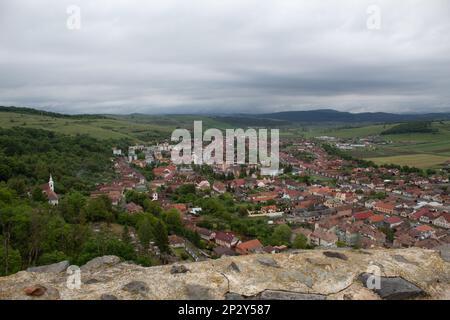 View of the town from inside the Cetatea Rupea (Rupea Fortress or Citadel) in Rupea, Romania Stock Photo