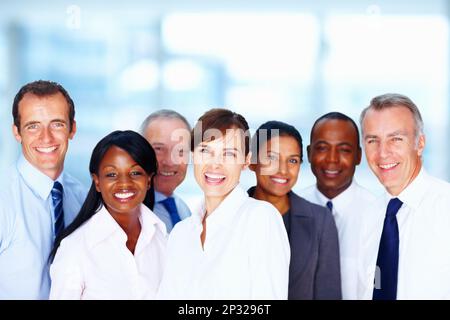 Multiracial business colleagues posing for a photograph. Group of multiracial business colleagues posing for a photograph. Stock Photo