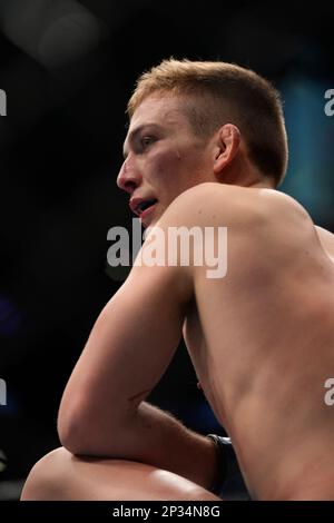 LAS VEGAS, NV - MARCH 4: Cameron Saaiman battles Mana Martinez in their Bantamweight fight during the UFC 285 event at T-Mobile Arena on March 4, 2023 in Las Vegas, NV, USA. (Photo by Louis Grasse/PxImages) Stock Photo