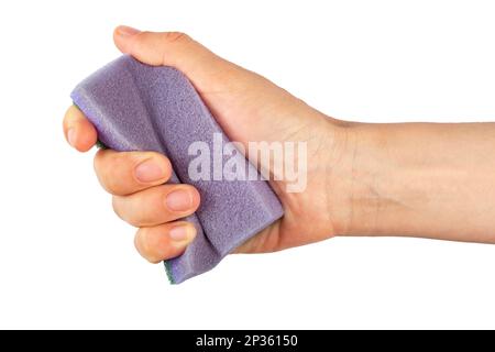 Sponge for washing and cleaning in female hand. Woman's hand gesture or sign isolated on white background. File contains clipping path. Stock Photo
