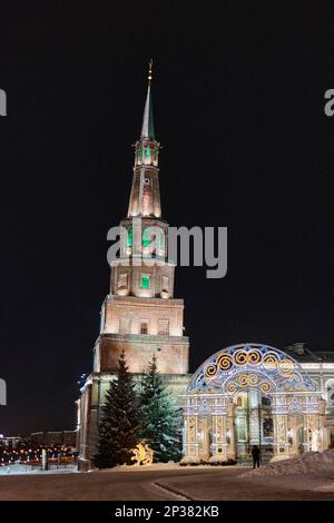 Leaning Suyumbike tower with muslim crescent in the Kazan Kremlin. Architectural symbol of Kazan, Russia. Historical monument. Festive evening illumin Stock Photo