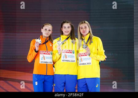 ISTANBUL, TURKEY - MARCH 5: Britt Weerman of the Netherlands, Yaroslava Mahuchikh of Ukraine and Kateryna Tabashnyk of Ukraine during the podium ceremony after competing in the High Jump Women during Day 3 of the European Athletics Indoor Championships at the Atakoy Athletics Arena on March 5, 2023 in Istanbul, Turkey (Photo by Nikola Krstic/BSR Agency) Stock Photo