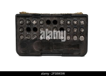 Old used set of screwdriver bits with parts missing, isolated on white background, top view Stock Photo