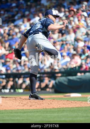 San Diego Padres Shawn Kelley throws the baseball during batting practice  while wearing red, white and blue socks before a ame against the St. Louis  Cardinals at Busch Stadium in St. Louis