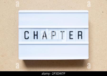Lightbox with word chapter on wood background Stock Photo