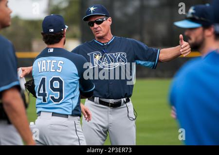 Tampa Bay Rays pitching coach Kyle Snyder, left, looks on as Shane  McClanahan holds his all-star jersey before a baseball game against the  Baltimore Orioles Saturday, July 16, 2022, in St. Petersburg