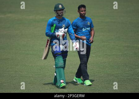 Nurul Hasan and tanvir Islam during the Bangladesh One Day International Cricket Team attends practice ahead of their ODI series third and last match Stock Photo