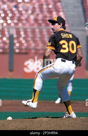 San Diego Padres Eric Show gets set to throw during first inning action  against the Chicago Cubs in Game 1 of the National League playoffs at  Chicago's Wrigley Field, Oct. 3, 1984.