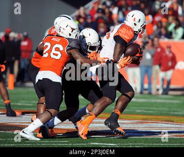 Linebacker Jordan Hicks (53) of Texas sets for play January 24