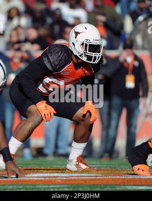 Linebacker Jordan Hicks (53) of Texas sets for play January 24