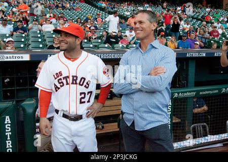 Seattle Mariners second baseman Bret Boone, right, walks in the dugout in  the seventh inning against the New York Yankees Friday, Aug. 13, 2004, at  Safeco Field in Seattle. (AP Photo/Ted S.