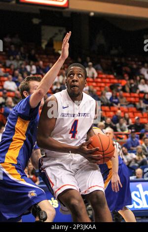 Jan 10, 2015; Laramie, WY, USA; Boise State Broncos guard Montigo Alford  (21) looks to pass against the Wyoming Cowboys during the second half at  Arena-Auditorium. The Cowboys beat the Broncos 65- …