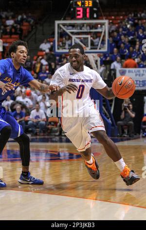 Jan 10, 2015; Laramie, WY, USA; Boise State Broncos guard Montigo Alford  (21) looks to pass against the Wyoming Cowboys during the second half at  Arena-Auditorium. The Cowboys beat the Broncos 65- …