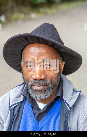 Portrait of a man wearing a black hat. Halle Gate, Brussels Stock Photo