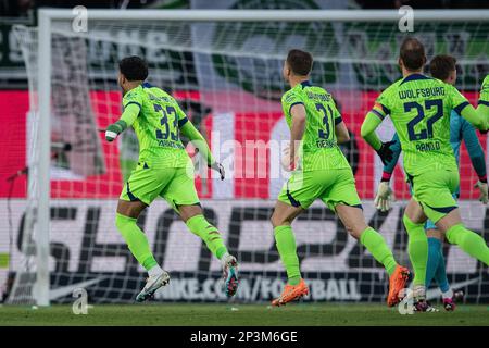 Wolfsburg, Germany. 05th Mar, 2023. Soccer: Bundesliga, VfL Wolfsburg - Eintracht Frankfurt, Matchday 23, Volkswagen Arena. Wolfsburg's Omar Marmoush (l) celebrates after scoring the opening goal to make it 1:0. Credit: Swen Pförtner/dpa - IMPORTANT NOTE: In accordance with the requirements of the DFL Deutsche Fußball Liga and the DFB Deutscher Fußball-Bund, it is prohibited to use or have used photographs taken in the stadium and/or of the match in the form of sequence pictures and/or video-like photo series./dpa/Alamy Live News Stock Photo