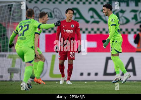 Wolfsburg, Germany. 05th Mar, 2023. Soccer: Bundesliga, VfL Wolfsburg - Eintracht Frankfurt, Matchday 23, Volkswagen Arena. Wolfsburg's Omar Marmoush (r) celebrates after scoring the opening goal to make it 1:0. Credit: Swen Pförtner/dpa - IMPORTANT NOTE: In accordance with the requirements of the DFL Deutsche Fußball Liga and the DFB Deutscher Fußball-Bund, it is prohibited to use or have used photographs taken in the stadium and/or of the match in the form of sequence pictures and/or video-like photo series./dpa/Alamy Live News Stock Photo