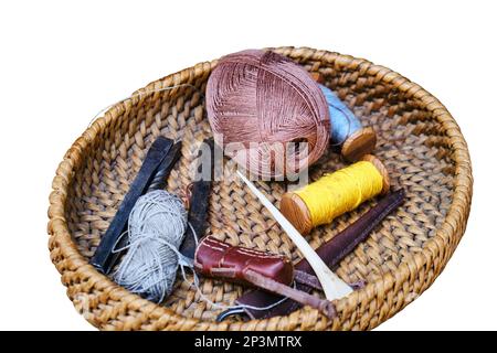 Retro set for sewing and leather goods, isolated on a white background. Vintage tools crafts cobbler and seamstress, isolated on a white background. T Stock Photo