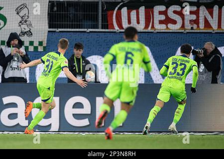 Wolfsburg, Germany. 05th Mar, 2023. Soccer: Bundesliga, VfL Wolfsburg - Eintracht Frankfurt, Matchday 23, Volkswagen Arena. Wolfsburg's Yannick Gerhardt (l) celebrates with teammate Omar Marmoush (r) after scoring the 2:2. Credit: Swen Pförtner/dpa - IMPORTANT NOTE: In accordance with the requirements of the DFL Deutsche Fußball Liga and the DFB Deutscher Fußball-Bund, it is prohibited to use or have used photographs taken in the stadium and/or of the match in the form of sequence pictures and/or video-like photo series./dpa/Alamy Live News Stock Photo