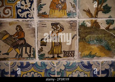 Catalan tiles trade. 19th century.  Man working threads. Kitchen. Monastery of Pedralbes. Barcelona. Catalonia. Spain. Stock Photo