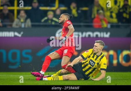 Dortmund, Germany. 3rd Mar, 2023.  Christopher Nkunku (RBL), Nico Schlotterbeck (BVB) Borussia Dortmund - RB Leipzig Bundesliga 03.03.2023  Copyright Stock Photo