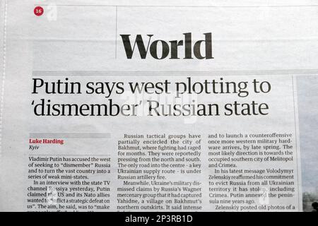 Guardian newspaper headline article Vladimir 'Putin says west plotting to 'dismember' Russian state' 26 February 2023 London UK Stock Photo