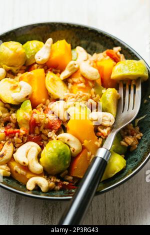 Spelt with Brussels Sprouts and Winter Squash Stock Photo