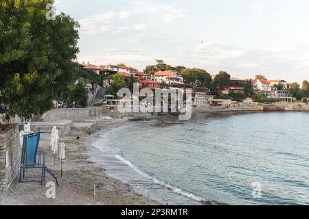 Nessebar, Bulgaria - July 20, 2014: Coastal view of Nessebar old town, ordinary people walk the street Stock Photo