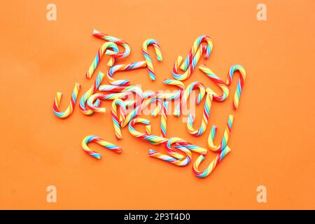 mini cherry candy canes on white background  Stock Photo