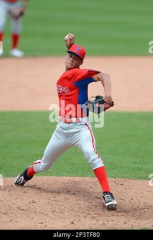 Pitcher Giovanni Abreu (17) of George Washington High School in New York  playing for the Philadelphia Phillies scout team during the East Coast Pro  Showcase on August 1, 2013 at NBT Bank