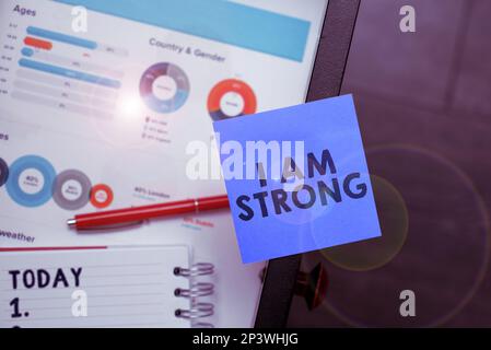 Text caption presenting I Am Strong. Word for Have great strength being healthy powerful achieving everything Stock Photo