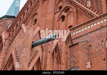 Gargoyle on the cathedral in Frombork, Poland. Frombork is famous for the castle and the cathedral and the astronomer Nicolaus Copernicus. Stock Photo