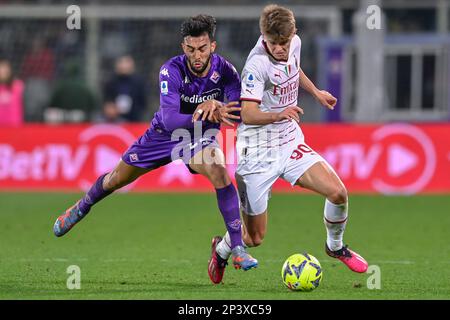 Artemio Franchi stadium, Florence, Italy, March 04, 2023, Charles De Ketelaere (AC Milan) and Nicolas Gonzalez (ACF Fiorentina)  during  ACF Fiorentin Stock Photo