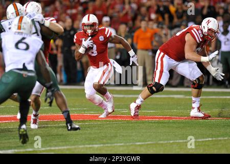 September 20 2014: Cornhusker running back Ameer Abdullah runs back kickoff  during the game between Miami (