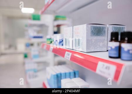 Healthcare retail store shelves stocked with various medicinal products and aloe vera cream ready for customers to come and buy during checkup visit in pharmacy. Medicine support service and concept Stock Photo